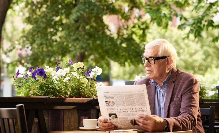 Senior Man Reading Newspaper